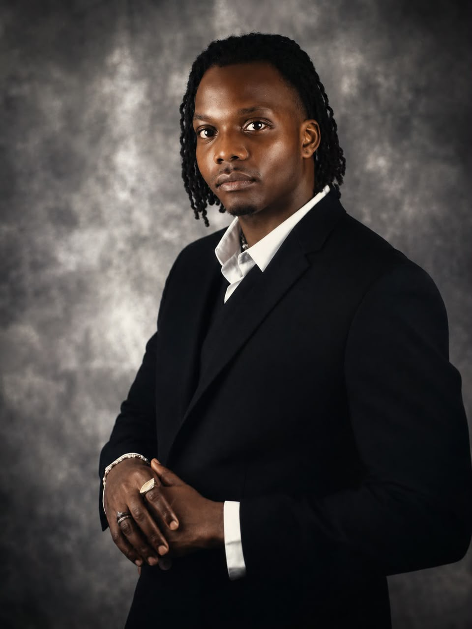 Isaac Umoren, Founder of Le Lörd Homes, in a black suit